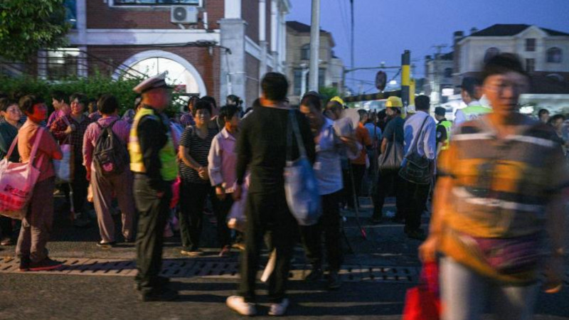 AFP: французское новостное агентство рассказало о поденщиках в Шанхае