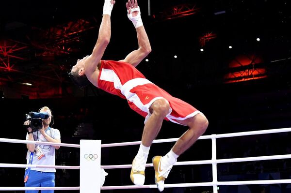 Представитель сборной Узбекистана по боксу Абдумалик Халоков (-57 кг) свой первый бой завершил с успехом. - Sputnik Узбекистан