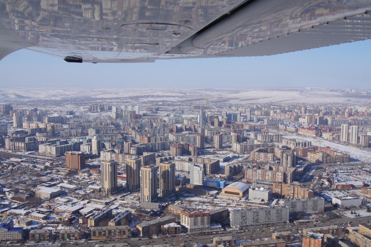 Do some flying. Вид с самолета Красноярск зимой. Зимний вид Красноярска с самолёта.