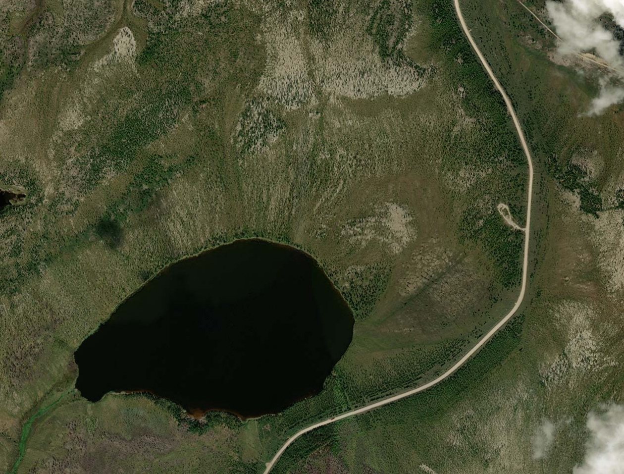В этом районе в 40-е годы располагался торфоучасток "Чёрное озеро"