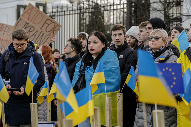 Украинские беженцы во время акции протеста в Варшаве