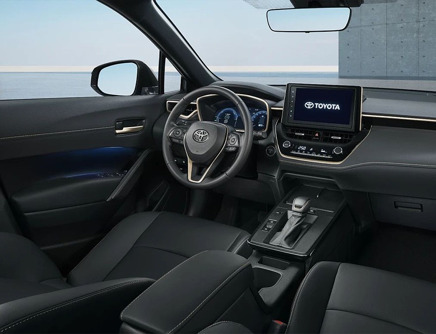 На фото: салон Toyota Corolla Cross the 60th