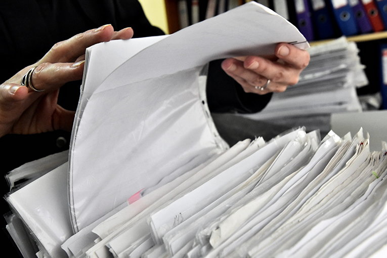 Эксперты сомневаются в необходимости конвертации бумажных документов в электронные