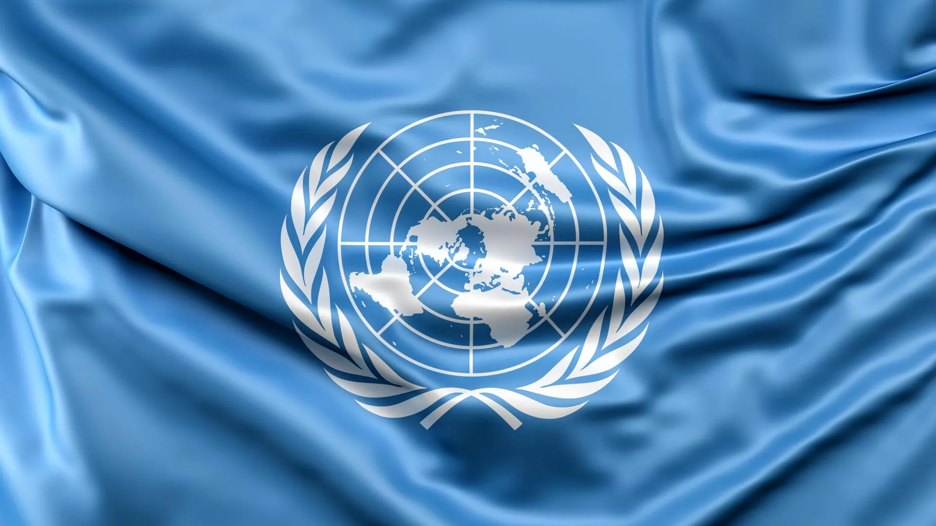 Сколько лет оон. Флаг ООН. ООН United Nations. United Nations флаг. Первый флаг ООН.