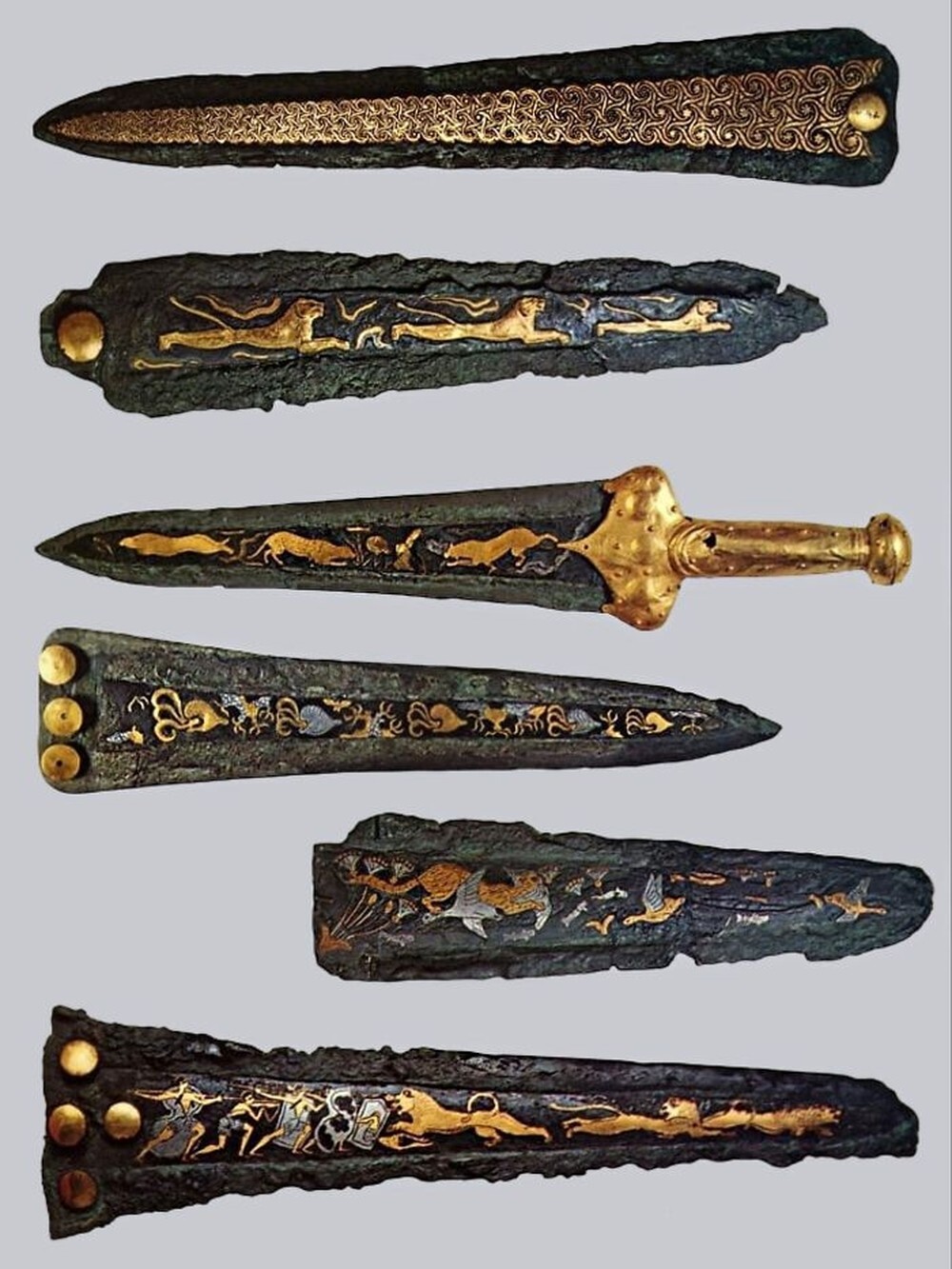 14. Микенские бронзовые кинжалы, инкрустированные золотом и серебром. XVI век до н.э.