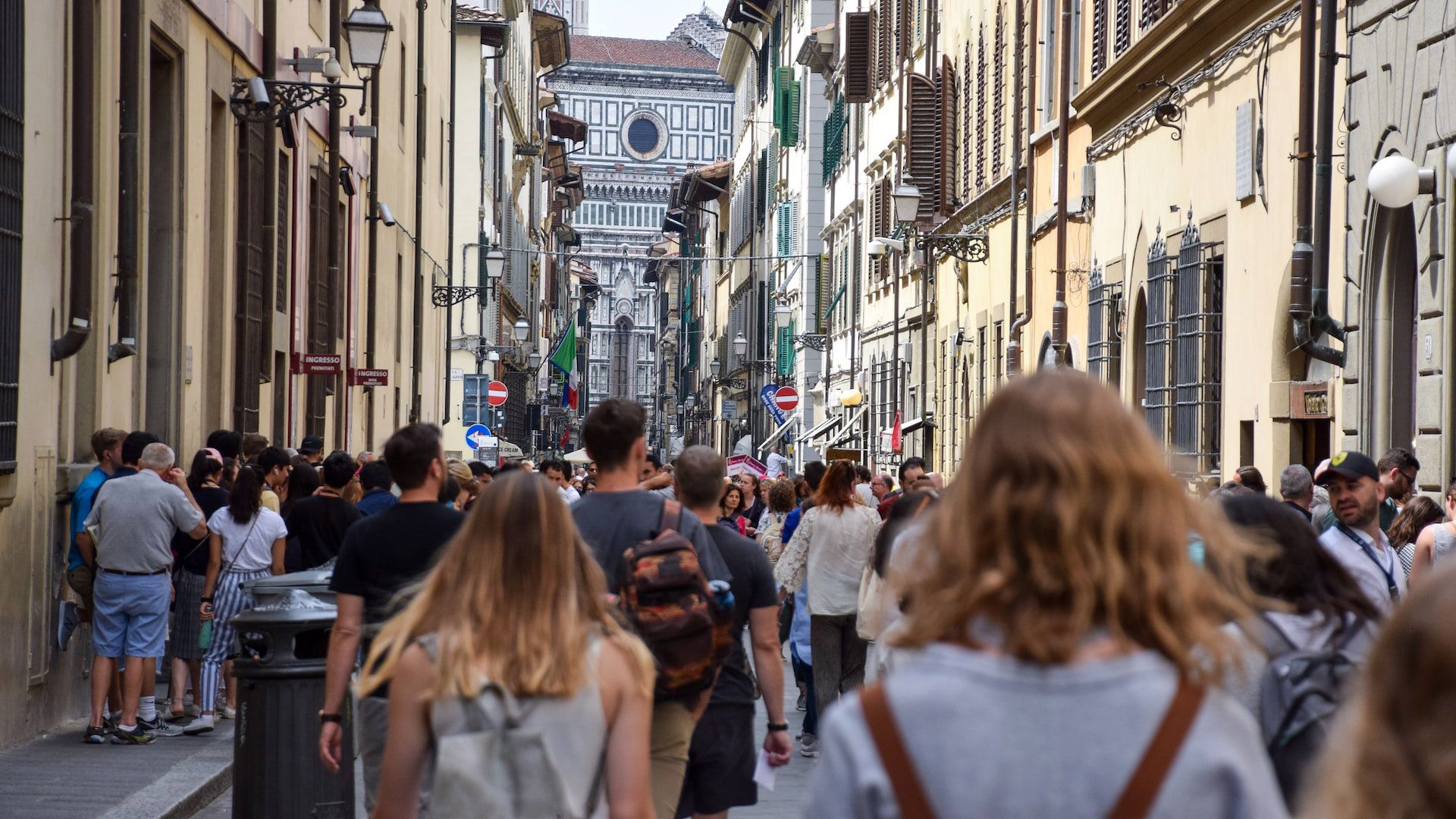 British tourist. European Street crowded. Overtourism.