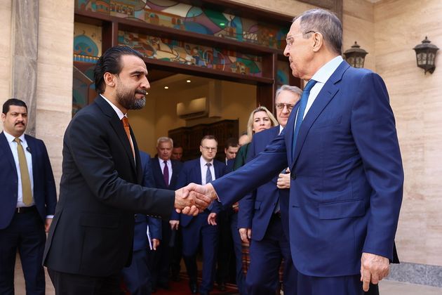 Ирак. Багдад. Министр иностранных дел РФ Сергей Лавров и спикер парламента Ирака Мухаммед аль-Халбуси (справа налево) во время встречи.