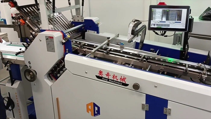 Cкоростная фальцевальная машина AOQI-480T-8K+6KW-R установлена на 