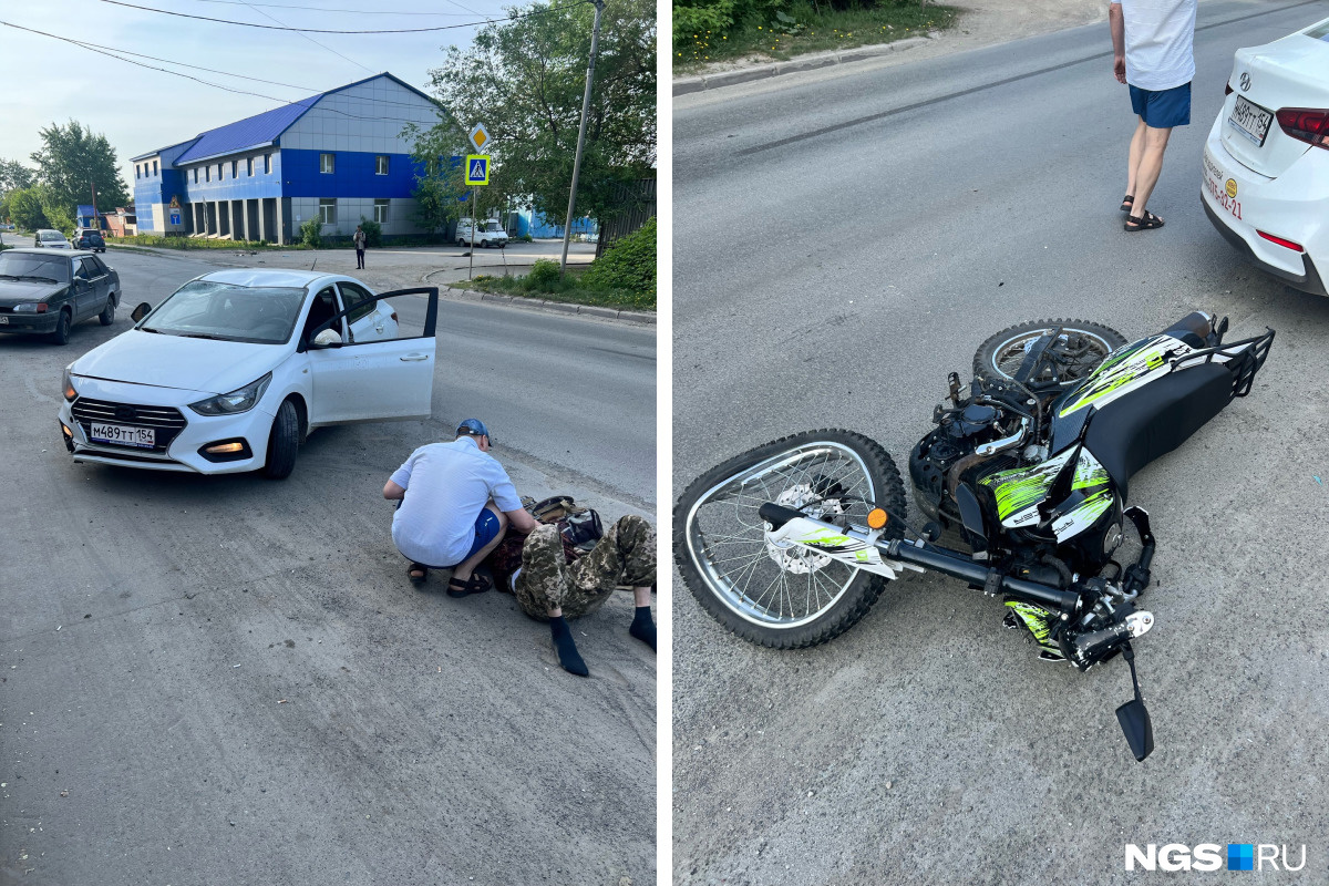 Мотоцикл лежит на дороге
