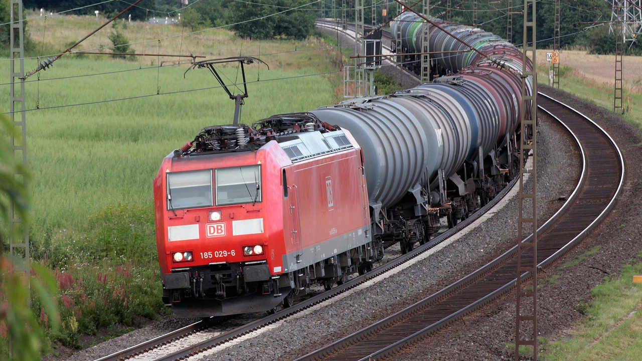 Db cargo. Грузовой вагон красный. Жд перевозки грузов. Cargo логотип. Db cargo eurasia gmbh.