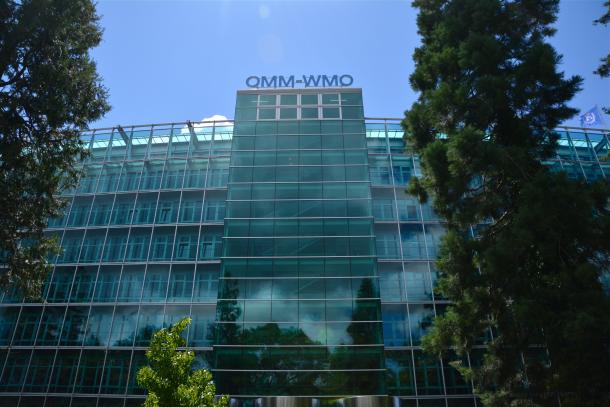 Glass facade of building with WMO sign