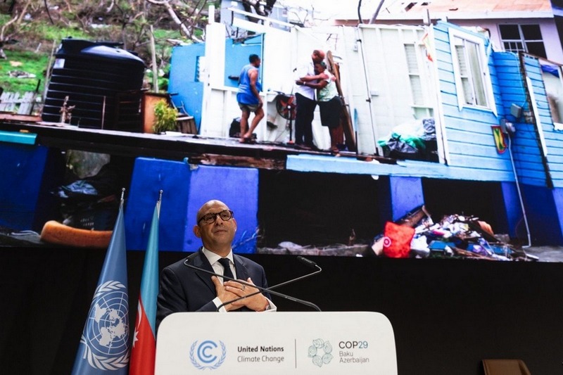 Simon Stiell addresses delegates at the opening of COP29