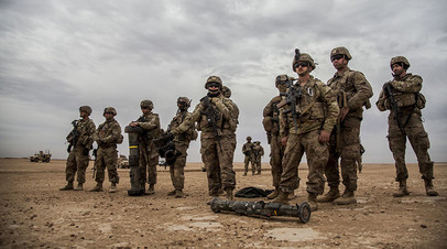 Американские военные во время совместных учений с боевиками оппозиционной группировки «Сирийские демократические силы». 8 декабря 2021 года
