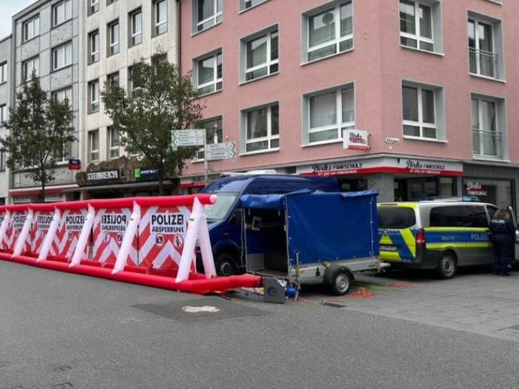 Германия — Выстрелы среди витрин