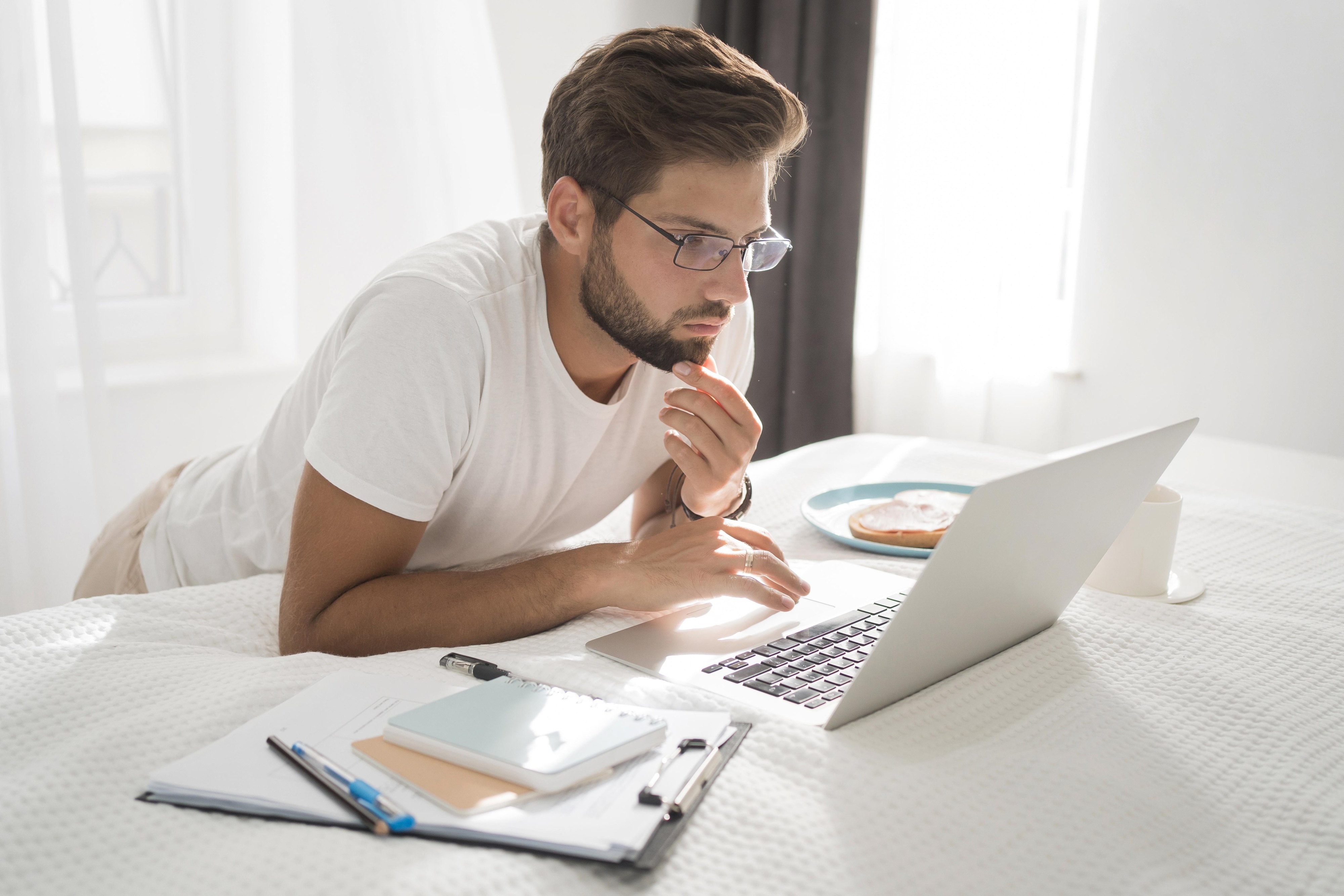 casual-adult-male-enjoying-working-home.jpg