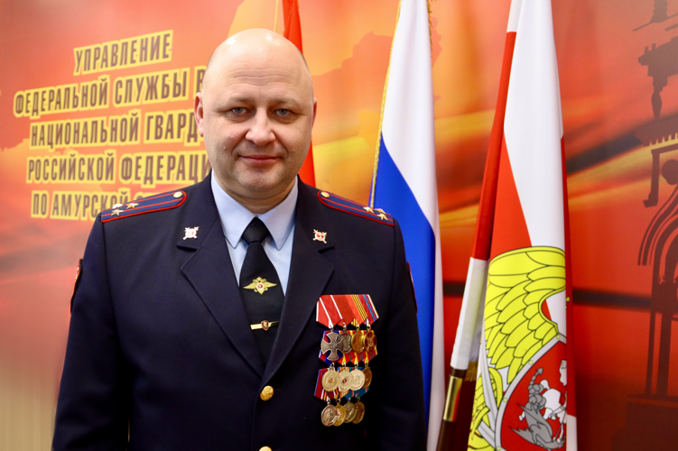 Поздравление начальника Управления Росгвардии по Амурской области полковника полиции Виталия Харчёва с наступающим Новым годом и Рождеством Христовым